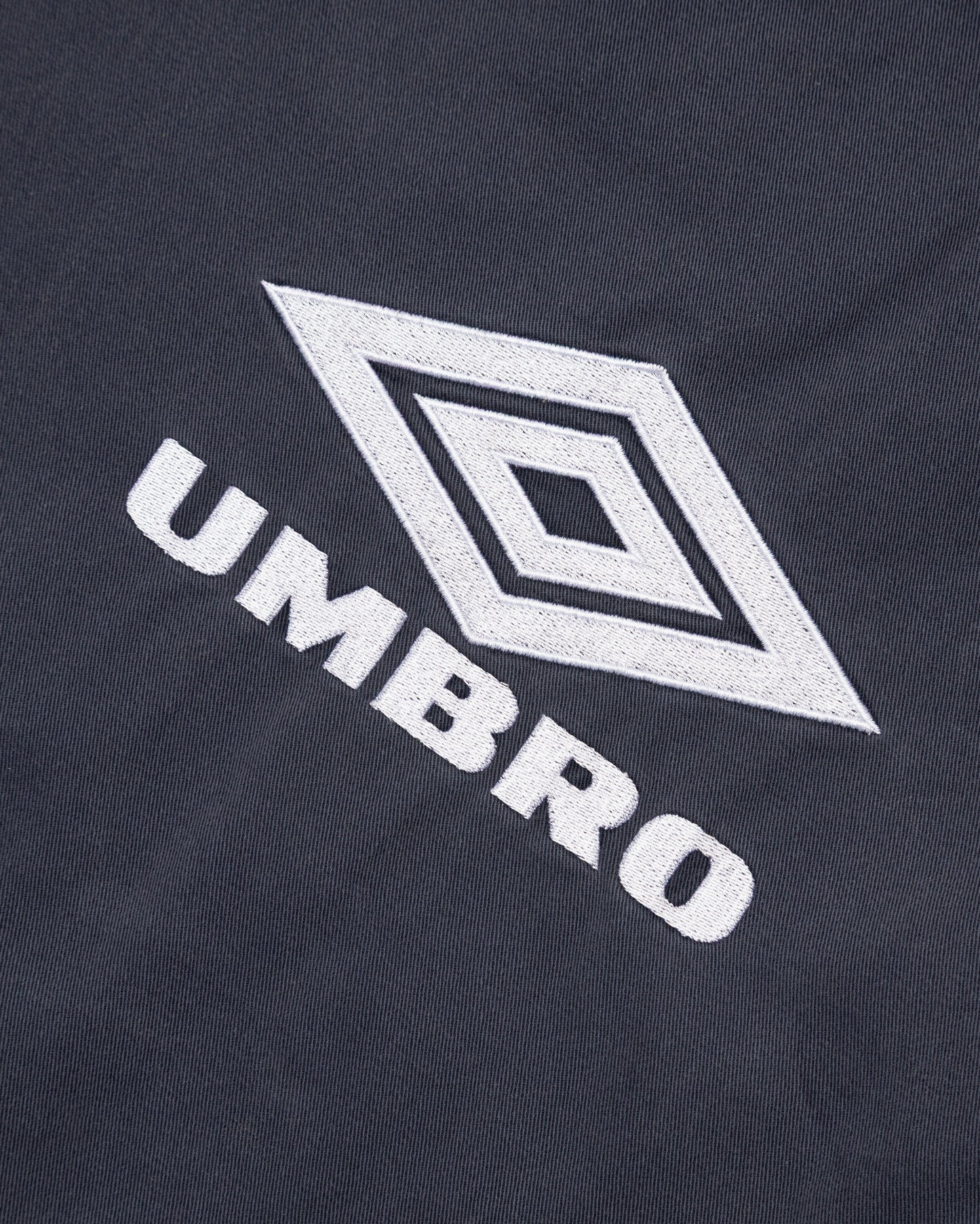 Throwing Fits x Umbro Drill Top
